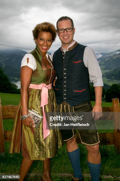 Arabella Kiesbauer and Florens Eblinger, during the 14th Almrauschparty at Rosi's Sonnbergstuben on August 4, 2017 in Kitzbuehel, Austria.