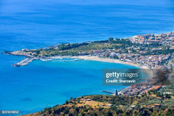 sicilian coastline near taormina - giardini naxos, italy - naxos sicily stock pictures, royalty-free photos & images