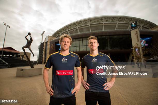 Rory Sloane of the Crows and Robbie Gray of the Power pose during the media conference to confirm match dates in Adelaide and Perth respectively for...