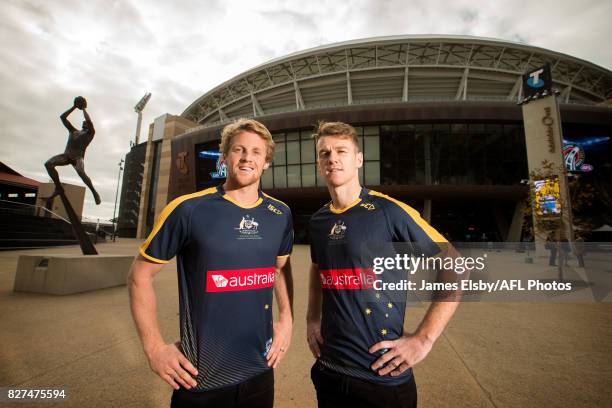 Rory Sloane of the Crows and Robbie Gray of the Power pose during the media conference to confirm match dates in Adelaide and Perth respectively for...