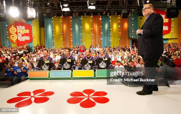 Derek Armstrong, Denis Gauthier, Kyle Calder and Dustin Brown tape a special hockey-themed showcase with host Drew Carey on "The Price Is Right" at...