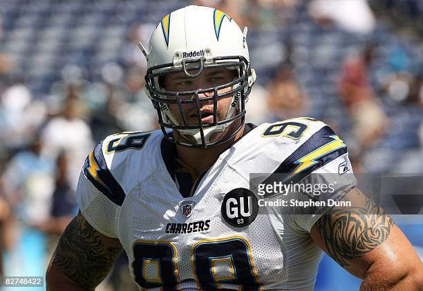 Defensive end Igor Olshansky of the San Diego Chargers looks on during warmups before the game against the Carolina Panthers on September 7, 2008 at...