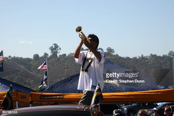 Chargers fan blows his trumpet in the parking lot before the game between the Carolina Panthers the San Diego Chargers on September 7, 2008 at...