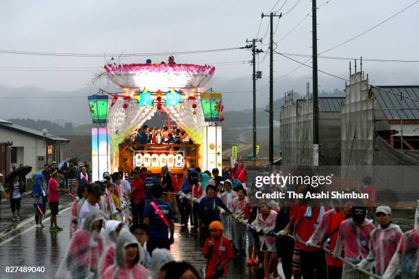 Float rolls through the new downtown area during the Tanabata festival on August 7, 2017 in Rikuzentakata, Iwate, Japan. The disaster-hit northern...