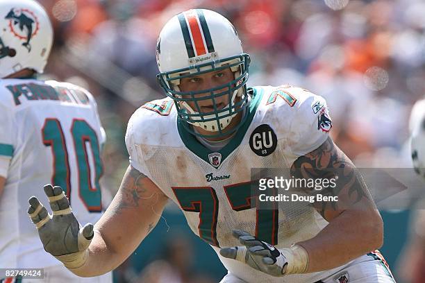 Offensive tackle Jake Long of the Miami Dolphins pass blocks against the New York Jets at Dolphin Stadium on September 7, 2008 in Miami, Florida. The...