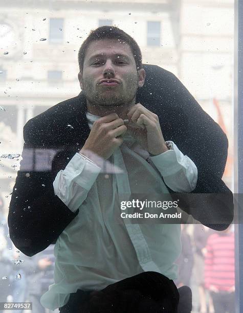 Jason Dundas showcases designs during the Cosmopolitan Neutrogena Underwater Fashion Shoot at Customs House on September 10, 2008 in Sydney,...