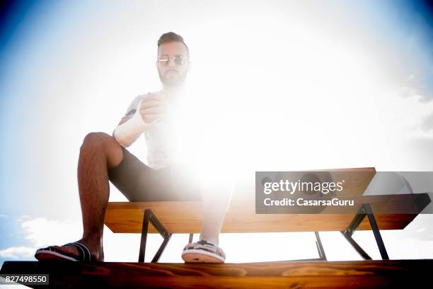 portrait of injured athlete - injured hand stock pictures, royalty-free photos & images