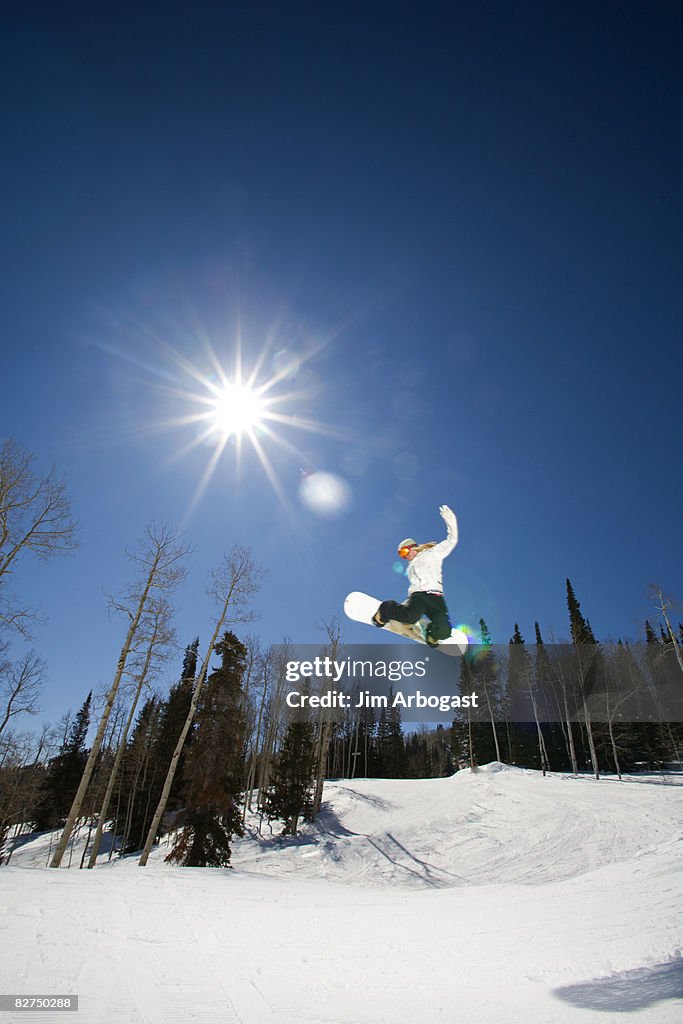 Portrait of young women in mid-air.