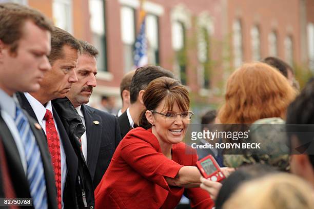 Secret Service agents keep an eye on the crowd as they provide protection for Republican vice presidential candidate Alaska Governor Sarah Palin at a...