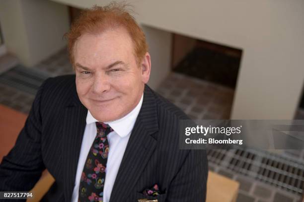 Nick Holland, chief executive officer of Gold Fields Ltd., poses for a photograph at the annual Diggers & Dealers Mining Forum in Kalgoorlie,...