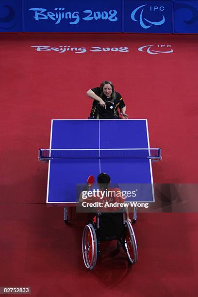 Pamela Pezzutto of Italy plays against Liu Jing of China during the final of the Women's WIC1-2 Table Tennis event at the Peking University Gymnasium...