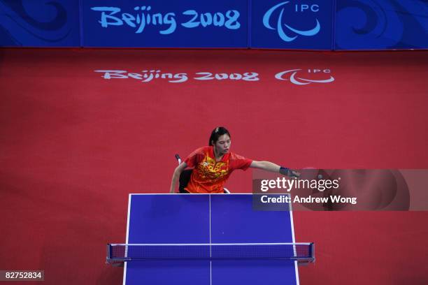 Liu Jing of China returns the ball against Pamela Pezzutto of Italy in the final of the Women's WIC1-2 Table Tennis event at the Peking University...