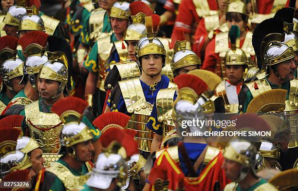 People of Mataro dressed up as ancient Roman soldiers attend Pope Benedict XVI's weekly audience in Paul VI hall at the Vatican on September 10,...