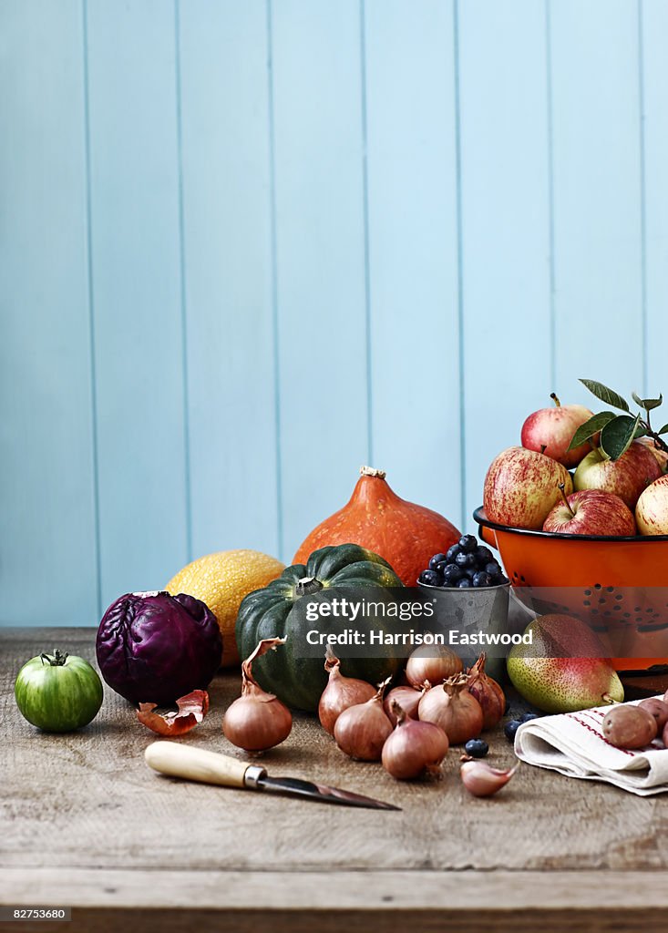 Selection of Autumn fruit and vegetables on table