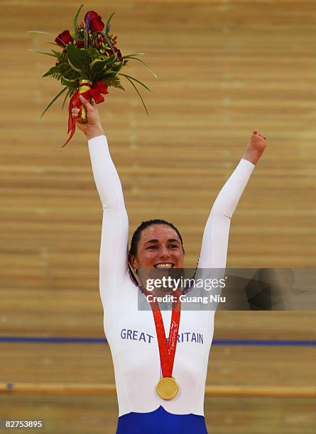 Sarah Storey of Great Britain celebrates on the podium with her gold medal after winning the Women's Individual Pursuit Track Cycling event at...