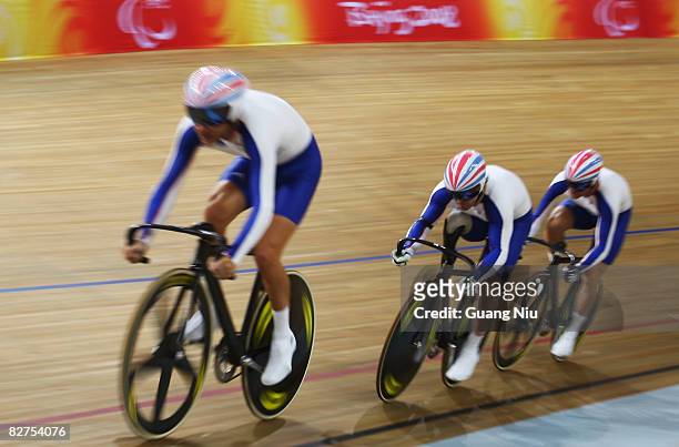 Darren Kenny, Jody Cundy, and Mark Bristow of Great Britain compete in the Men's Team Sprint Track Cycling event at Laoshan Velodrome during day four...