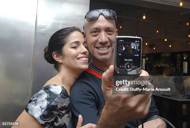 Actress Anna Ortiz and Celebrity Stylist Robert Verdi take a video with the Kodak Zi6 Camera while attending Microsoft's Great American Style at...