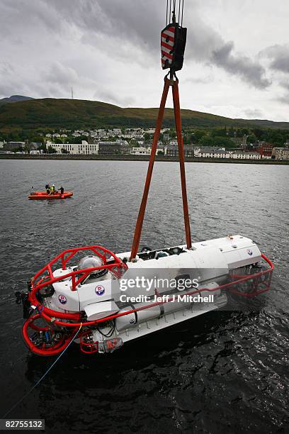 The LR7 rescue submarine is lowered into Loch Linnhe at Fort William where it is undergoing trials on September 10, 2008 in Fort William in Scotland....