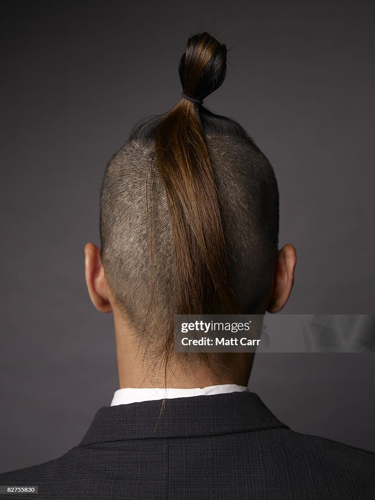 Rear view of man with mohawk