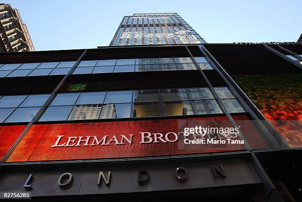 People walk past the headquarters of the investment bank, Lehman Brothers in Manhattan September 10, 2008 in New York City. Lehman Brothers reported...