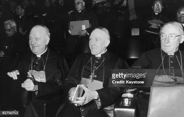 William John Cardinal Conway , the Primate of All Ireland, attends a Synod of bishops in Vatican City, 8th October 1974. With him are Gabriel Carrone...