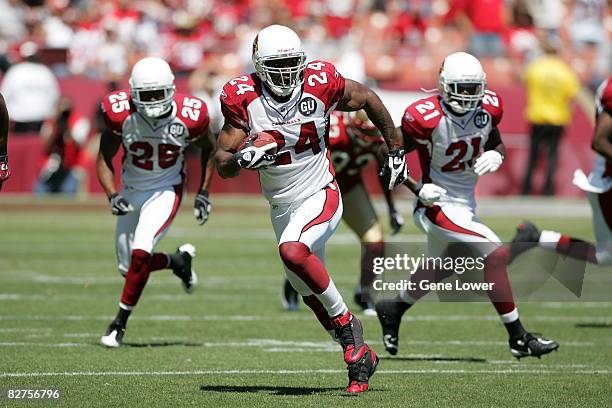 Arizona Cardinals safety Adrian Wilson makes an interception and runs down field during a game against the San Francisco 49ers on September 7, 2008...