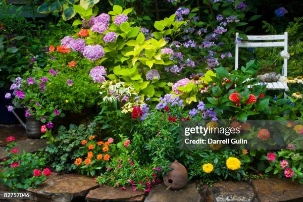 garden with chair - giardino domestico foto e immagini stock