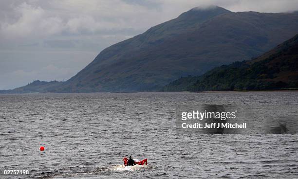Diver stands on the LR7 rescue submarine at Loch Linnhe near Fort William where it?s undergoing trials on September 10, 2008 in Fort William,...