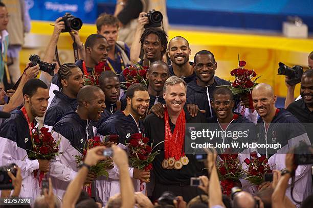 Summer Olympics: USA team and Mike D'Antoni victorious with gold medals after game vs Spain during Men's Final at Olympic Basketball Gymnasium in...