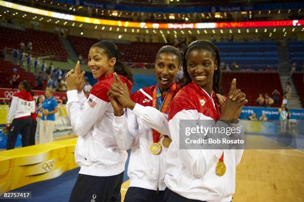 Summer Olympics: USA Candace Parker , Lisa Leslie and Delisha Milton-Jones victorious with gold medals after game vs Australia during Women's Gold...