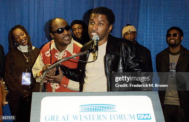 Singers Kenneth "Babyface" Edmonds and Stevie Wonder speak during press conference for Stevie Wonder's 6th Annual House Full of Toys Benefit press...