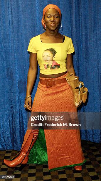 Singer India.Arie poses for photographers during Stevie Wonder's 6th Annual House Full of Toys Benefit press conference December 15, 2001 in...