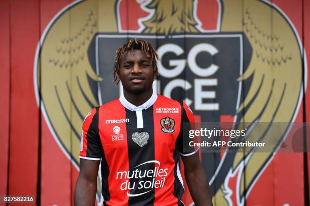 Nice's football club French midfielder Allan Saint-Maximin new signing poses during a press conference on August 8, 2017 at the Allianz Riviera...