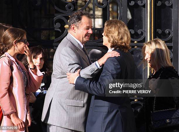 Jean Sarkozy, son of French President Nicolas Sarkozy chats with his uncle Guillaume Sarkozy as they arrive at the city hall in Neuilly-sur-Seine,...