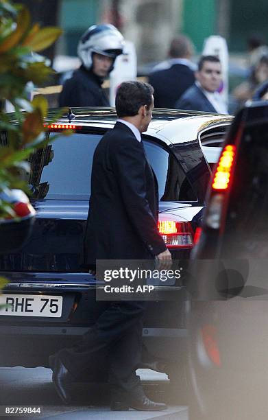 French President Nicolas Sarkozy arrives at the city hall in Neuilly-sur-Seine, outside Paris, on September 10 prior to the wedding of his son Jean...