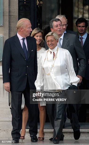 French immigration minister Brice Hortefeux , Patrick and Isabelle Balkany , both friends of French president Nicolas Sarkozy leave the city hall in...