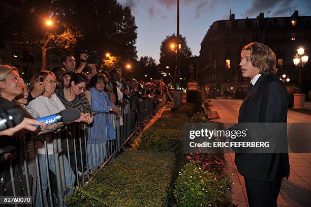 Jean Sarkozy, French President Nicolas Sarkozy's son talks with people in front of the city hall in Neuilly-sur-Seine, outside Paris, on September 10...