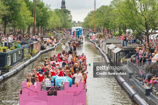 gay pride canal parade amsterdam - amsterdam gay pride stock pictures, royalty-free photos & images
