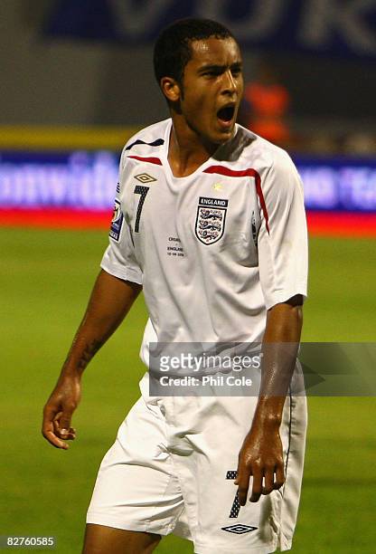 Theo Walcott of England celebrates scoring the opening goal during the FIFA 2010 World Cup Qualifying Group Six match between Croatia and England at...