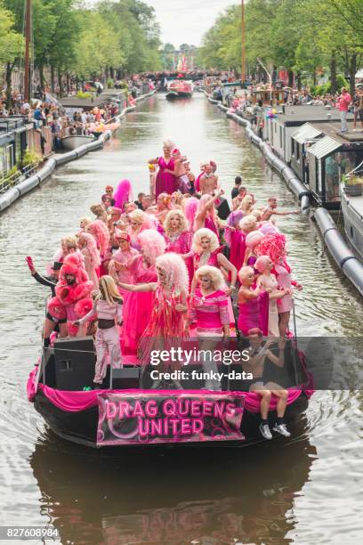 gay pride canal parade amsterdam - gay pride parade stock pictures, royalty-free photos & images