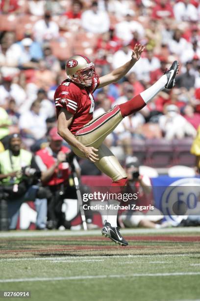 Punter Andy Lee of the San Francisco 49ers punts against the Arizona Cardinals during an NFL game on September 7, 2008 at Bill Walsh Field at...