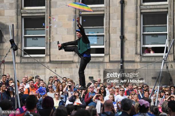 Edinburgh Festival Fringe entertainers perform on the Royal Mile on August 8, 2017 in Edinburgh, Scotland. This year marks the 70th anniversary of...