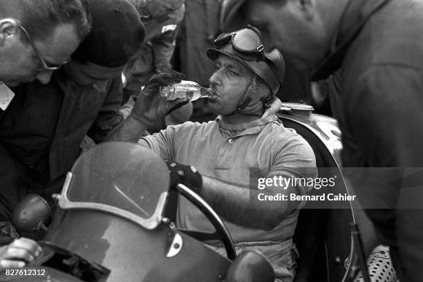 Juan Manuel Fangio, Maserati A6GCM, Grand Prix of Great Britain, Silverstone, 18 July 1953. Drinking.