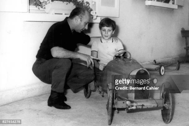 Juan Manuel Fangio, Paul-Henri Cahier, Bernard Cahier home , Evian, 10 August 1961. Juan Manuel Fangio with young Paul-Henri Cahier.