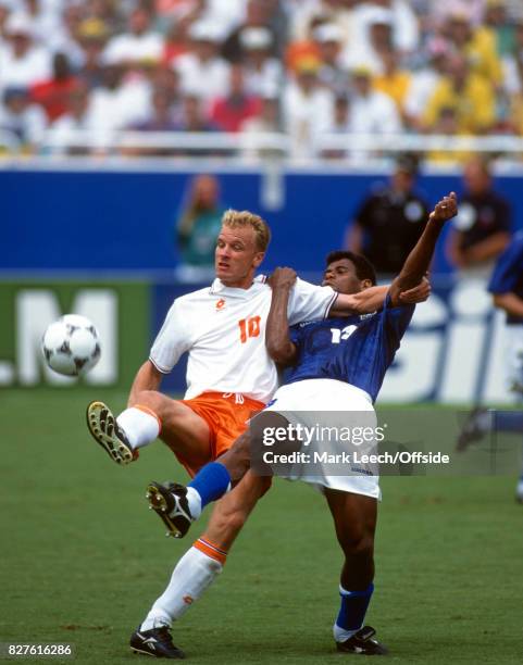 Fifa World Cup : Brazil v Netherlands :Dennis Bergkamp controls the ball under pressure from Mazinho of Brazil. Photo: Mark Leech