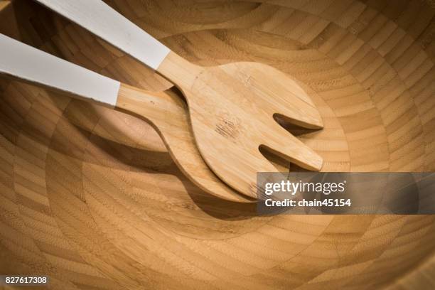 a set of wooden kitchen equipment in the wooden bowl. food and drink concept. - ciotola vuota foto e immagini stock