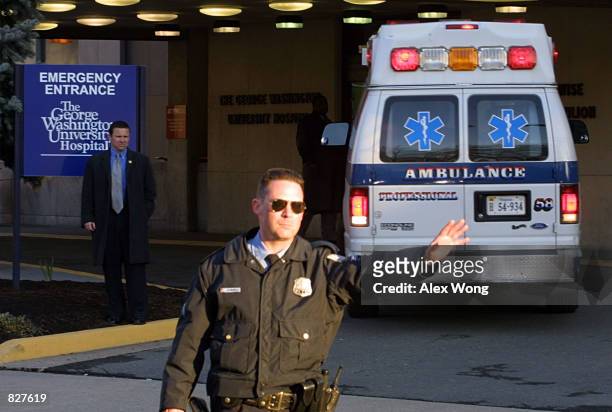 Secret Service officer directs traffic as an ambulance backs up at the George Washington University Hospital March 5, 2001 in Washington, DC. U.S....