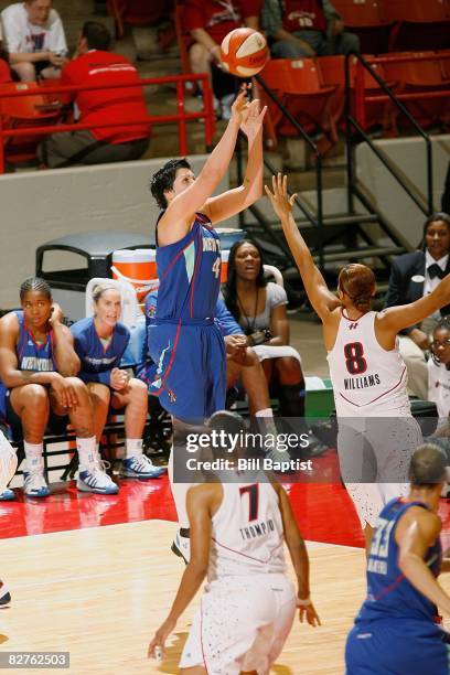 Janel McCarville of the New York Liberty shoots a jumper over Mistie Williams of the Houston Comets during the WNBA game on September 2, 2008 at...