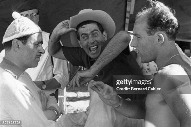 Maurice Trintignant, Luigi Musso, Stirling Moss, 12 Hours of Sebring, Sebring, 23 March 1957. Maurice Trintignant and Stirling Moss in a serious...