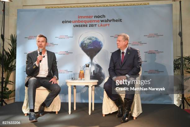 Moderator Dirk Steffens and Former Vice President Al Gore attend a press conference for 'An Inconvenient Sequel: Truth to Power' at Hotel Adlon on...